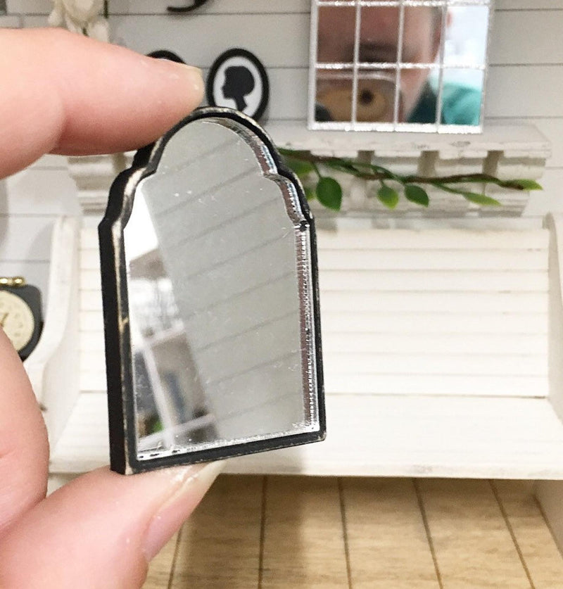 Miniature Oval Black Frame Mirror