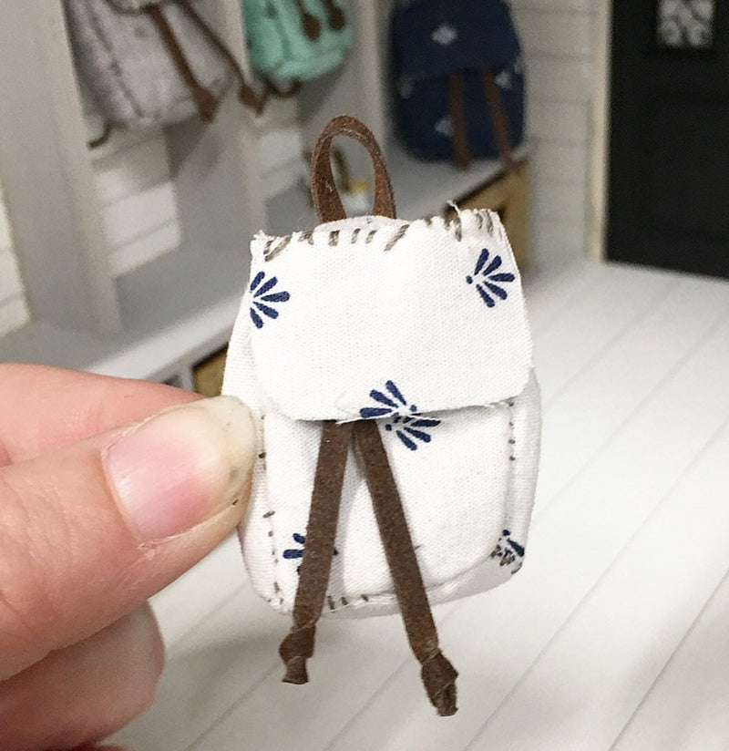Miniature farmhouse backpack blue fan